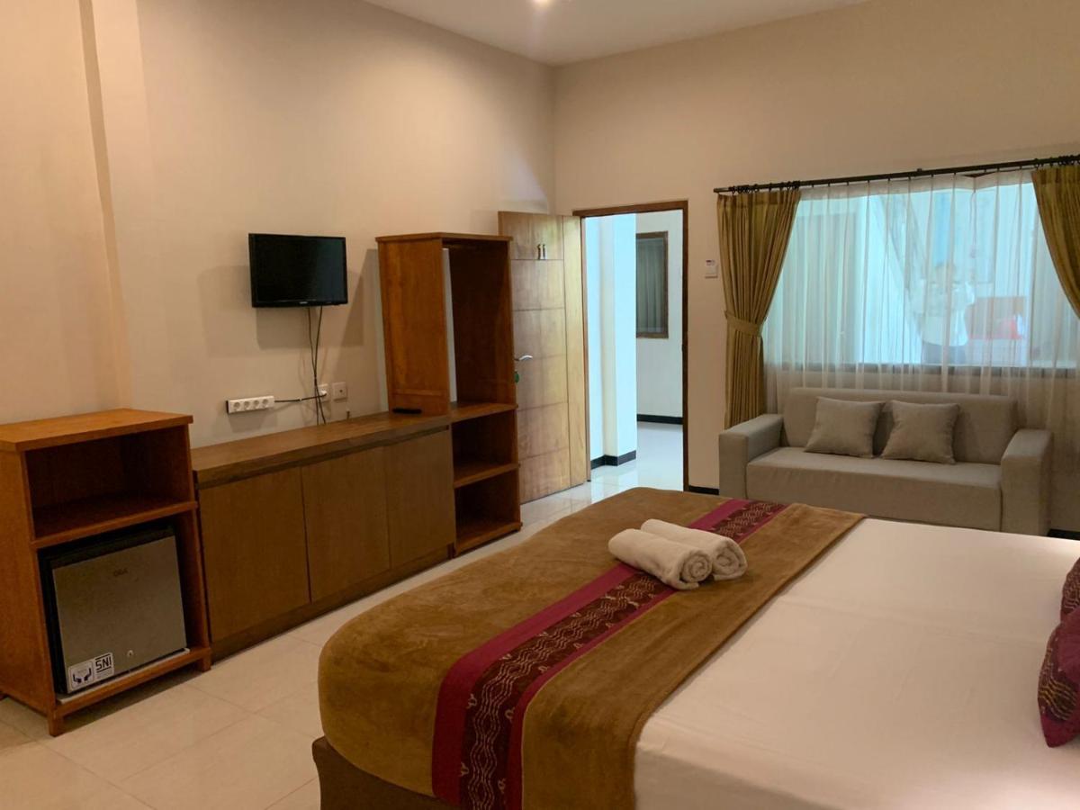 Kuta Suci Guesthouse Экстерьер фото