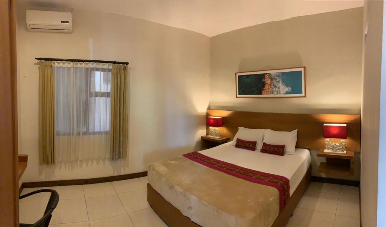 Kuta Suci Guesthouse Экстерьер фото
