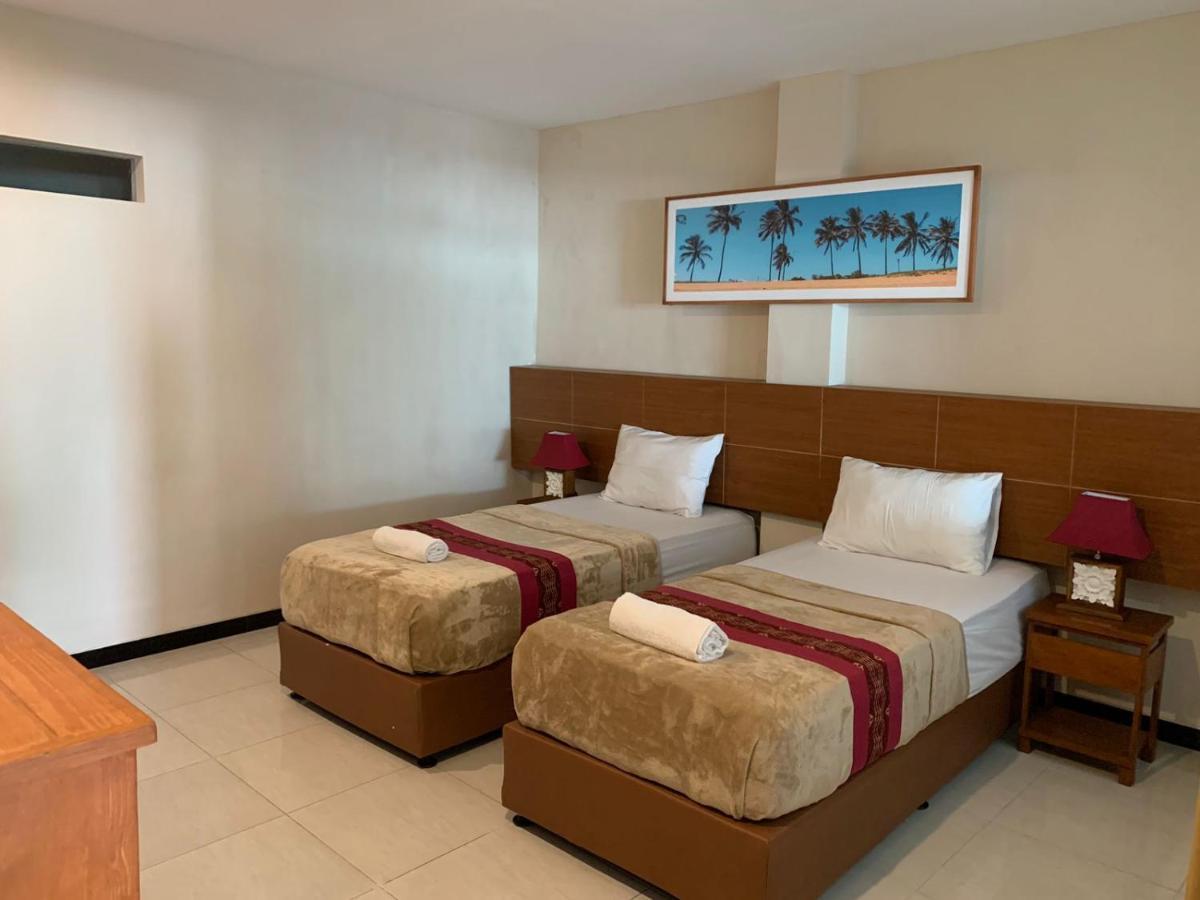 Kuta Suci Guesthouse Экстерьер фото