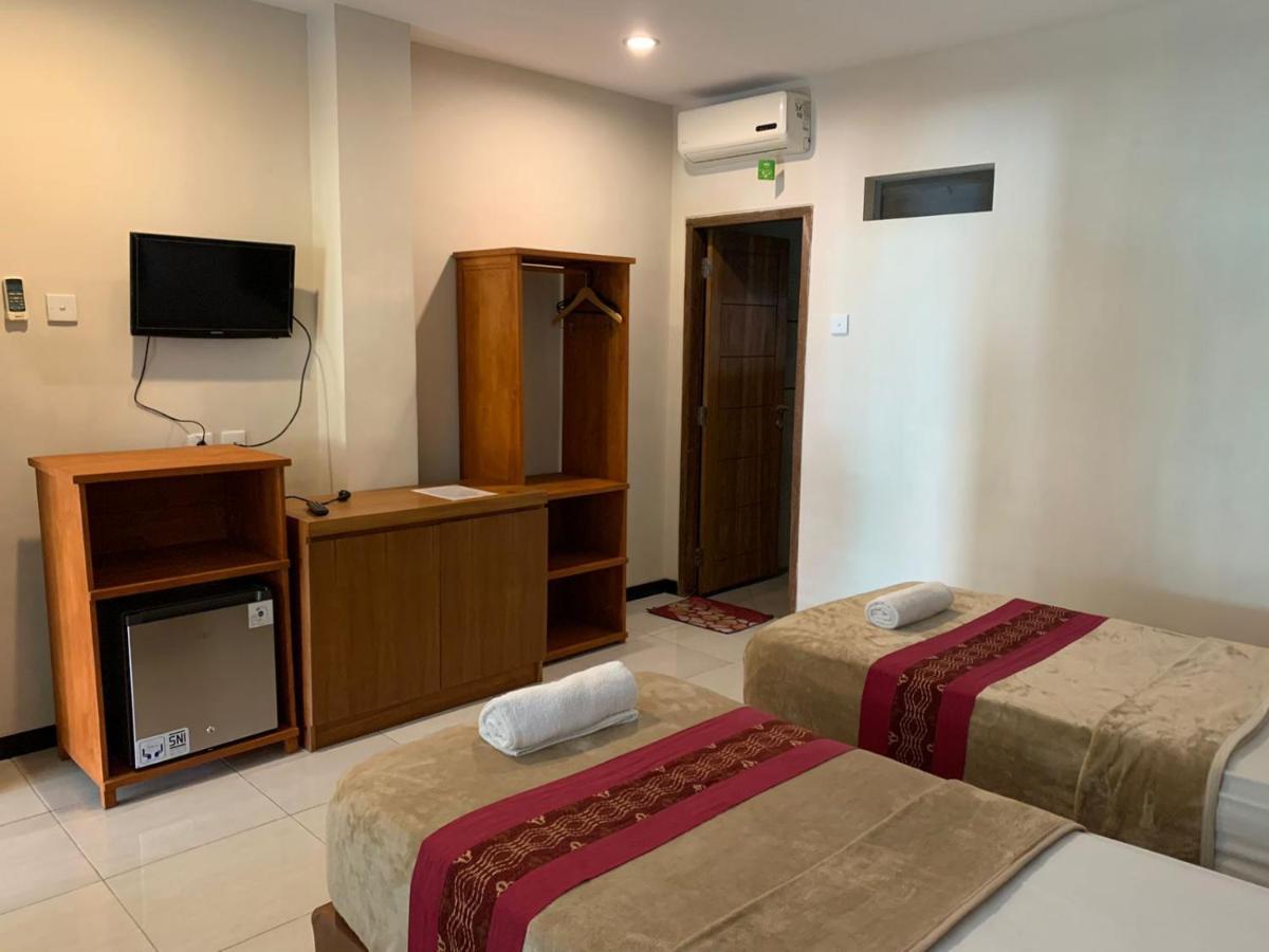 Kuta Suci Guesthouse Экстерьер фото