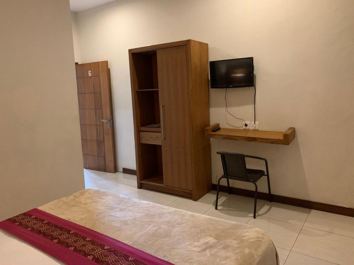 Kuta Suci Guesthouse Экстерьер фото
