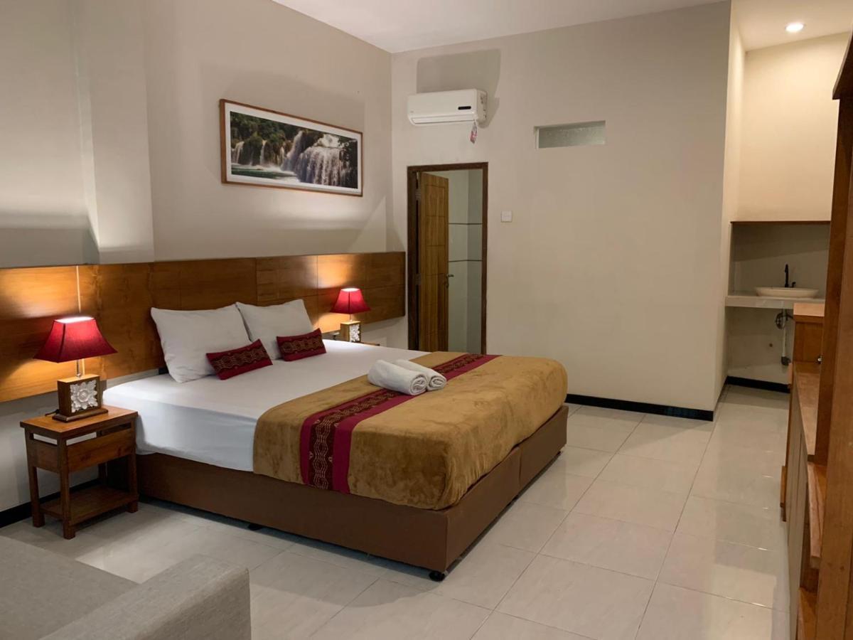 Kuta Suci Guesthouse Экстерьер фото