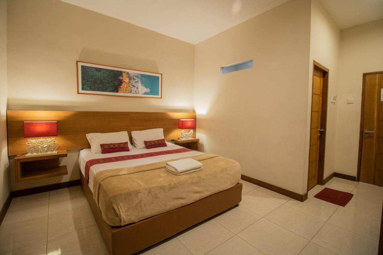 Kuta Suci Guesthouse Экстерьер фото