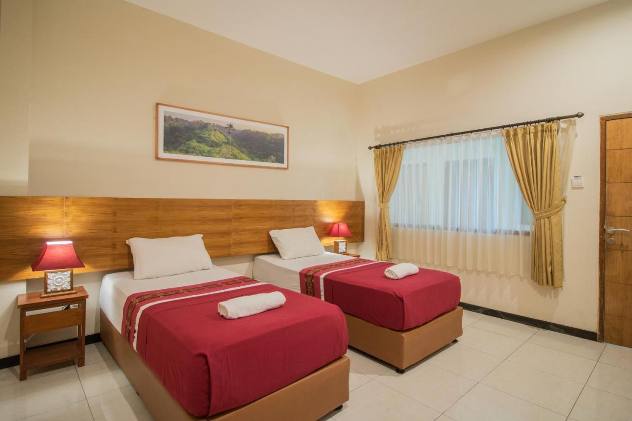 Kuta Suci Guesthouse Экстерьер фото