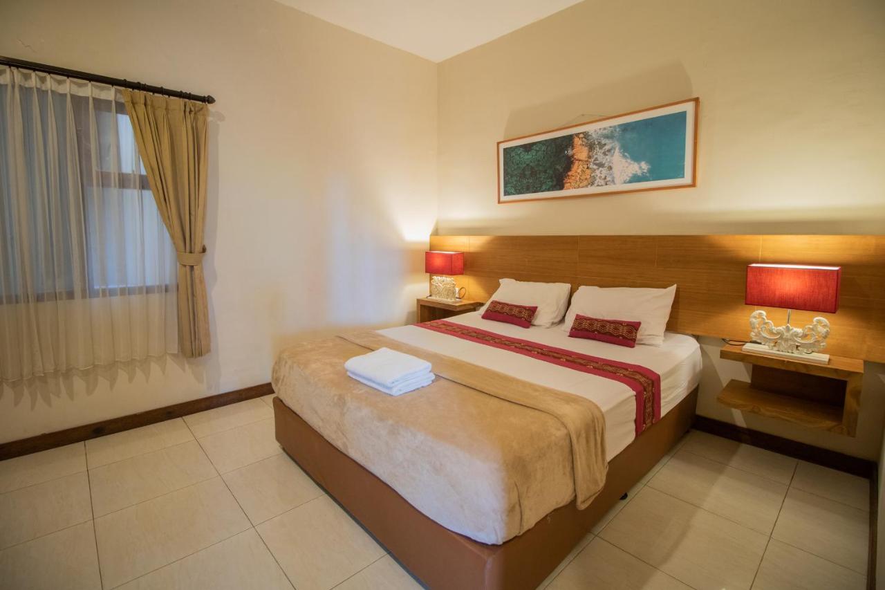 Kuta Suci Guesthouse Экстерьер фото
