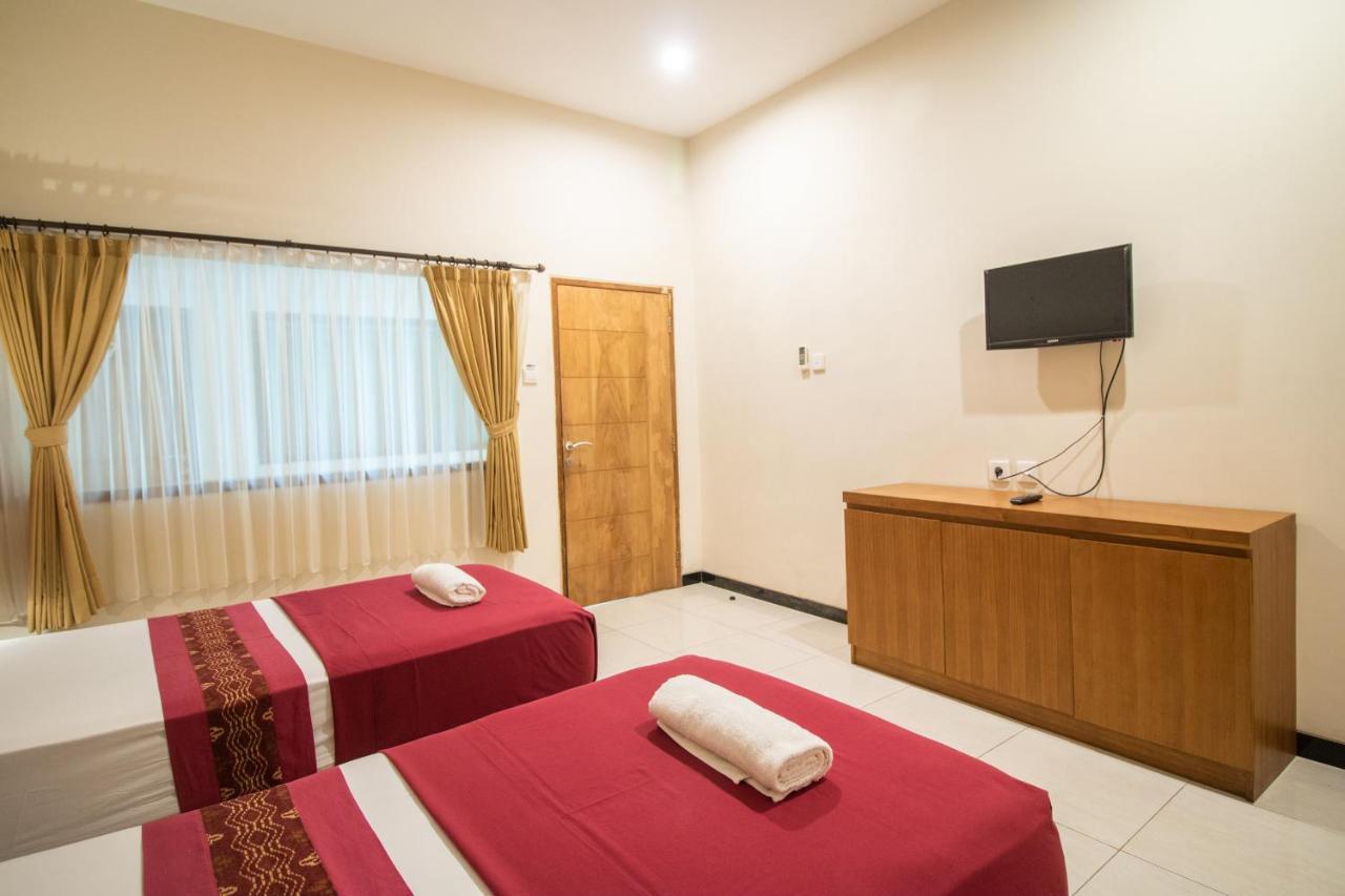 Kuta Suci Guesthouse Экстерьер фото