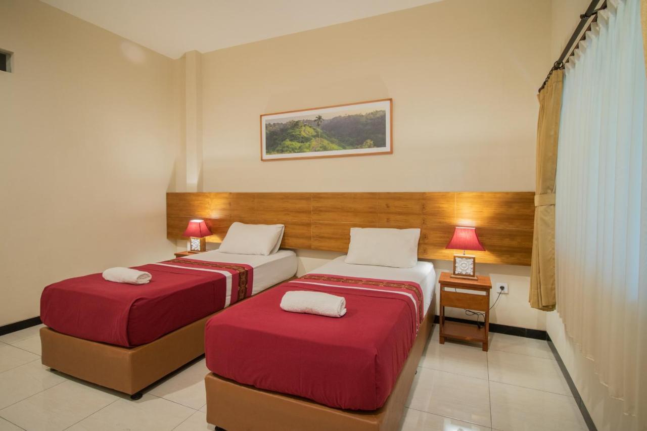 Kuta Suci Guesthouse Экстерьер фото