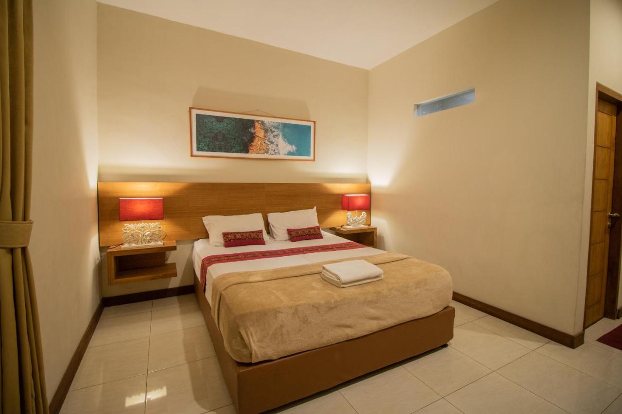 Kuta Suci Guesthouse Экстерьер фото