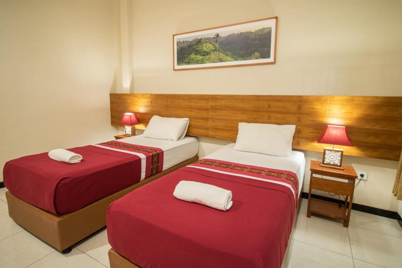 Kuta Suci Guesthouse Экстерьер фото