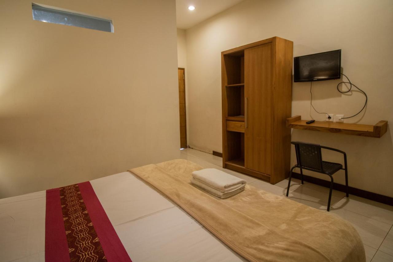 Kuta Suci Guesthouse Экстерьер фото
