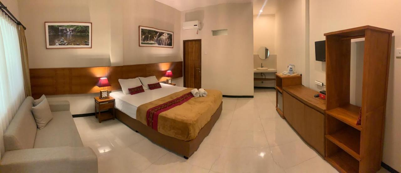 Kuta Suci Guesthouse Экстерьер фото