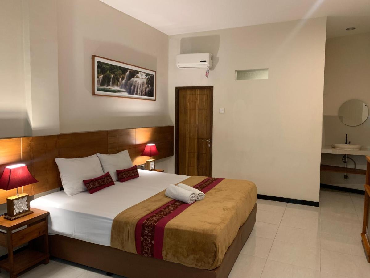 Kuta Suci Guesthouse Экстерьер фото