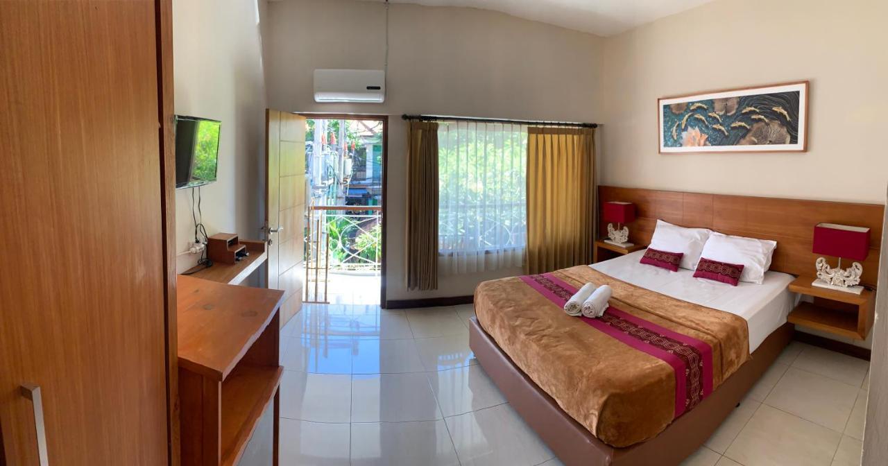 Kuta Suci Guesthouse Экстерьер фото