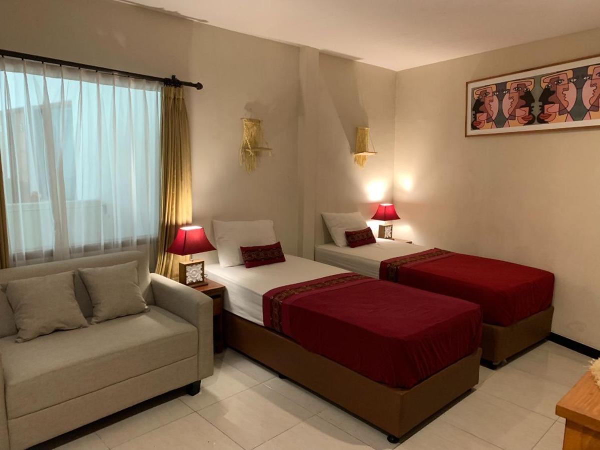 Kuta Suci Guesthouse Экстерьер фото