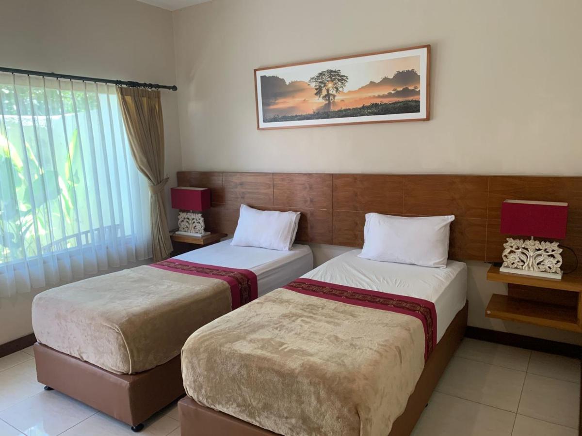 Kuta Suci Guesthouse Экстерьер фото