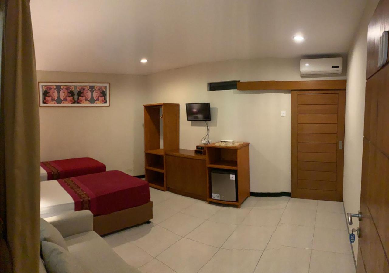 Kuta Suci Guesthouse Экстерьер фото