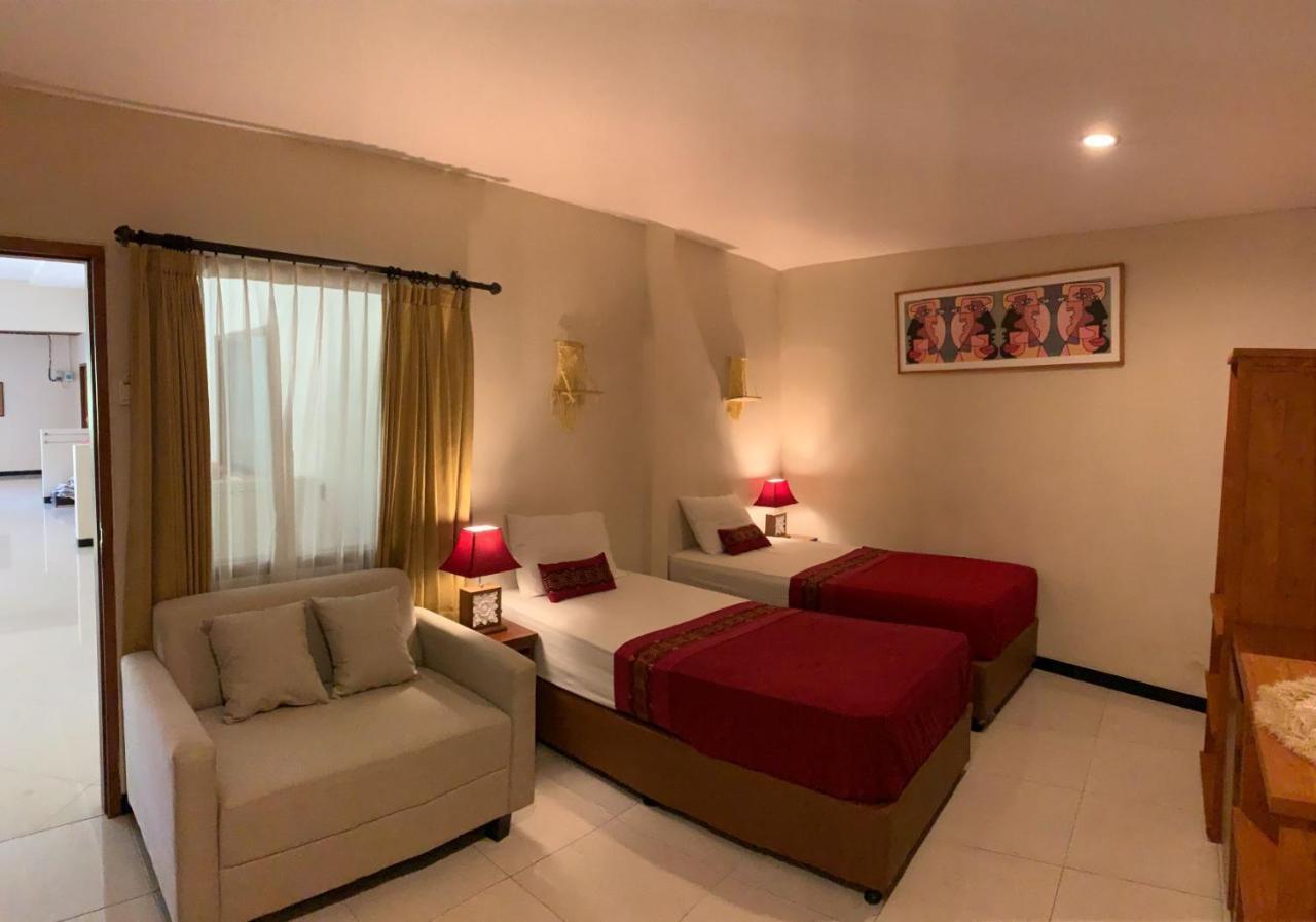 Kuta Suci Guesthouse Экстерьер фото