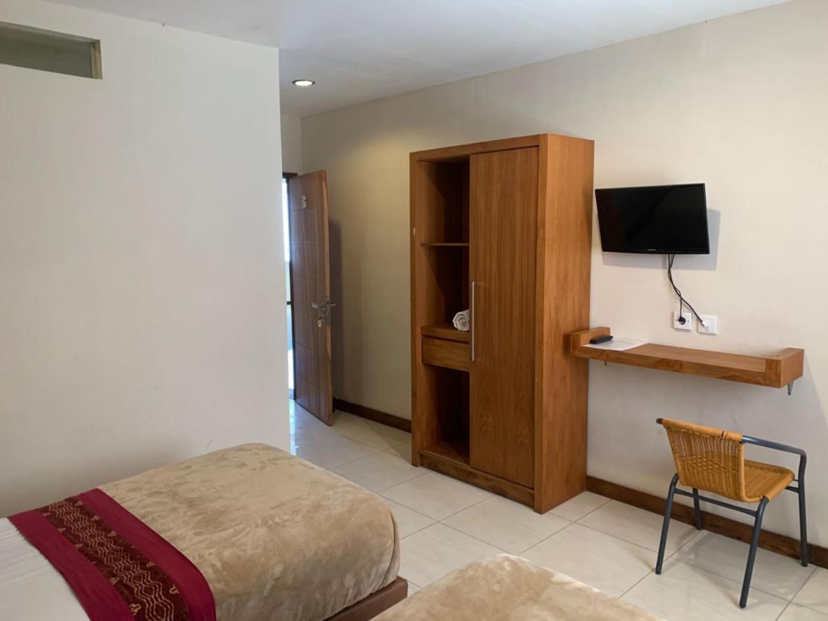 Kuta Suci Guesthouse Экстерьер фото