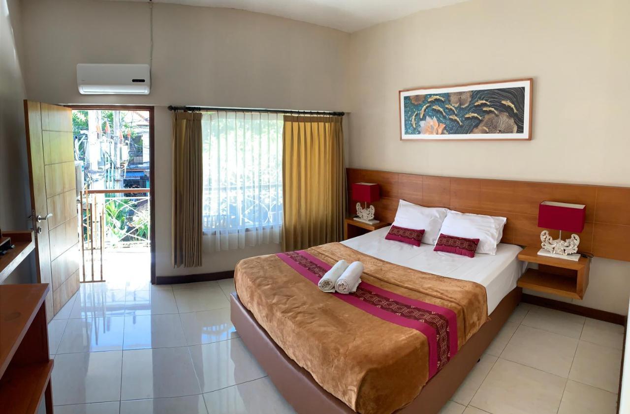 Kuta Suci Guesthouse Экстерьер фото