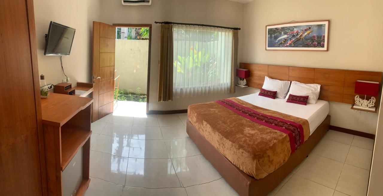 Kuta Suci Guesthouse Экстерьер фото