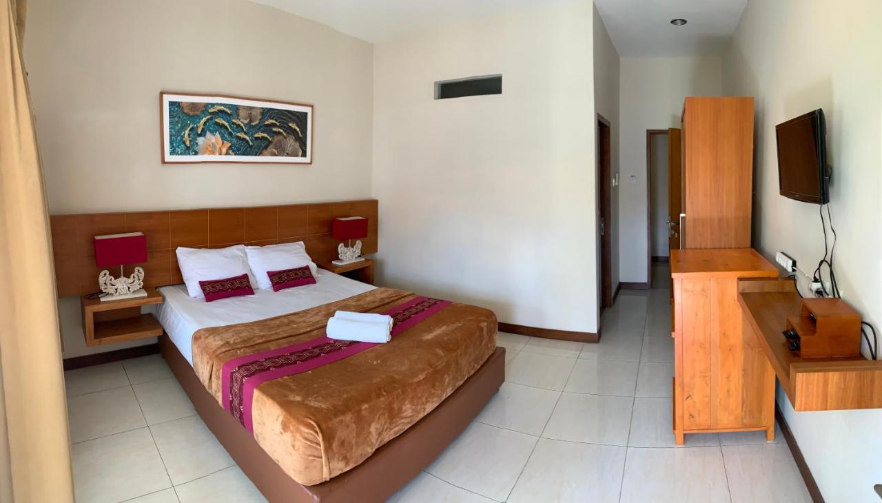 Kuta Suci Guesthouse Экстерьер фото