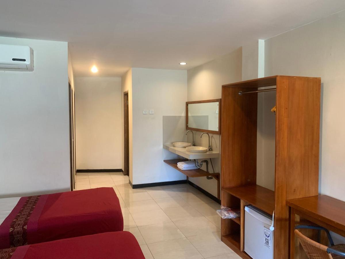 Kuta Suci Guesthouse Экстерьер фото