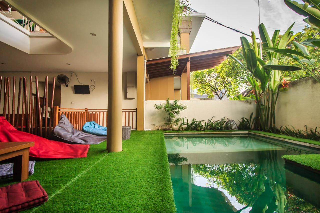 Kuta Suci Guesthouse Экстерьер фото